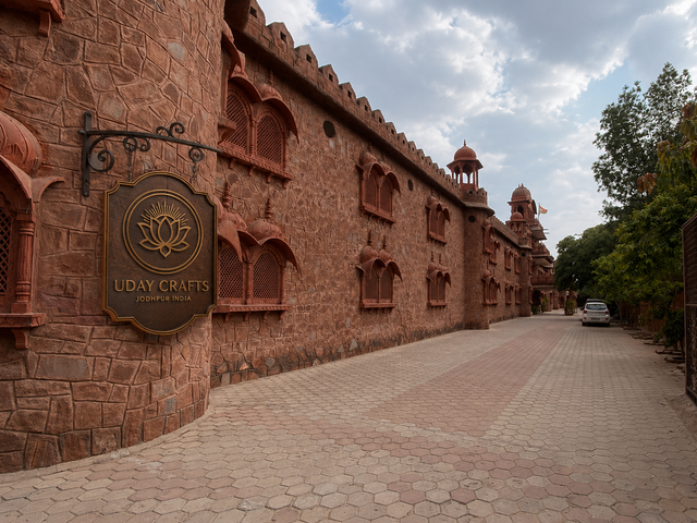 Uday Crafts signage on the red sandstone facade in Jodhpur
